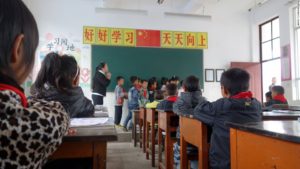 "Stand at attention," barked the class monitor as I and fellow visitors walked into the classroom at the Shahe Primary School, an hour's drive from the county seat of Tengchong, a remote region in China's Yunnan Province.